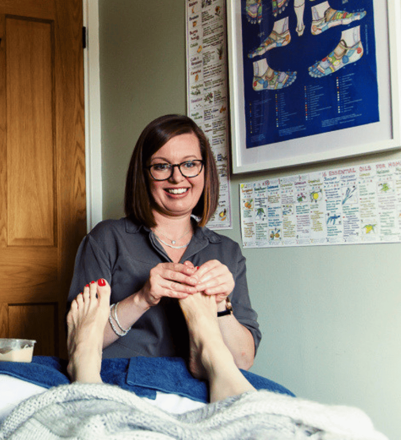 Gini using Scrummy Cream in her reflexology practise